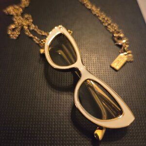 Fun Kate spade necklace “In the shade” gold sunglasses